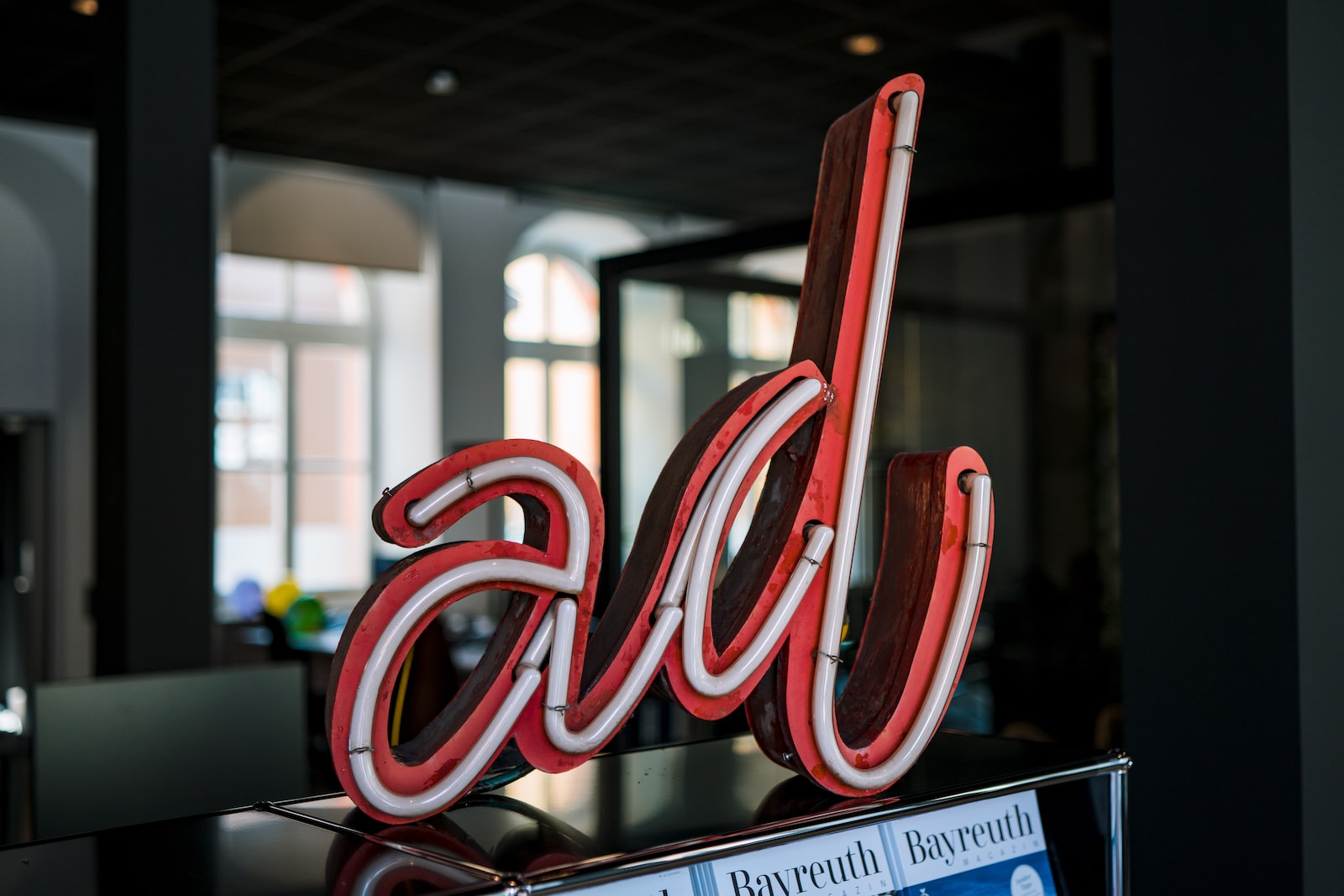 red and white love neon light signage